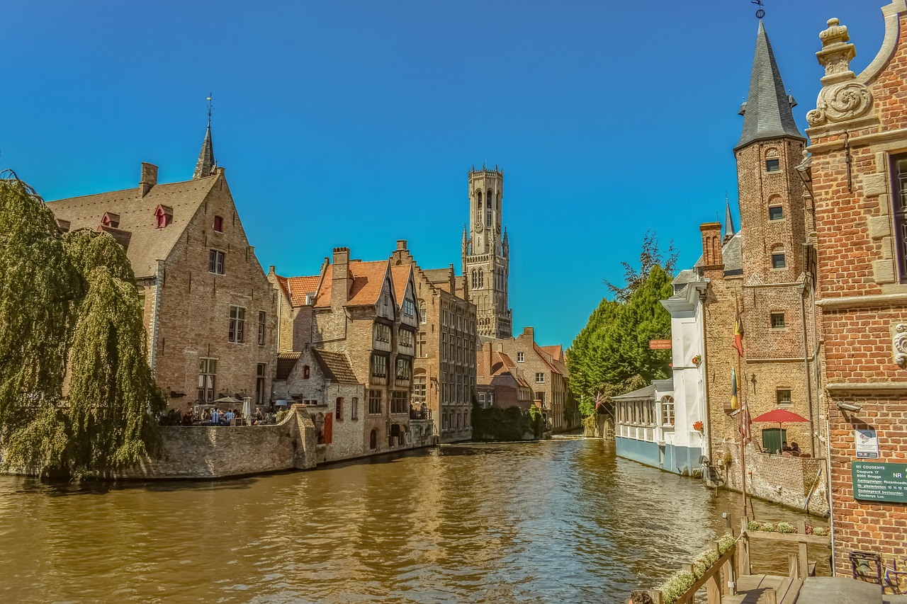 In this image, a diverse array of elements is depicted, including buildings, trees, bodies of water, wooden structures, individuals, and the expanse of the sky.\n
